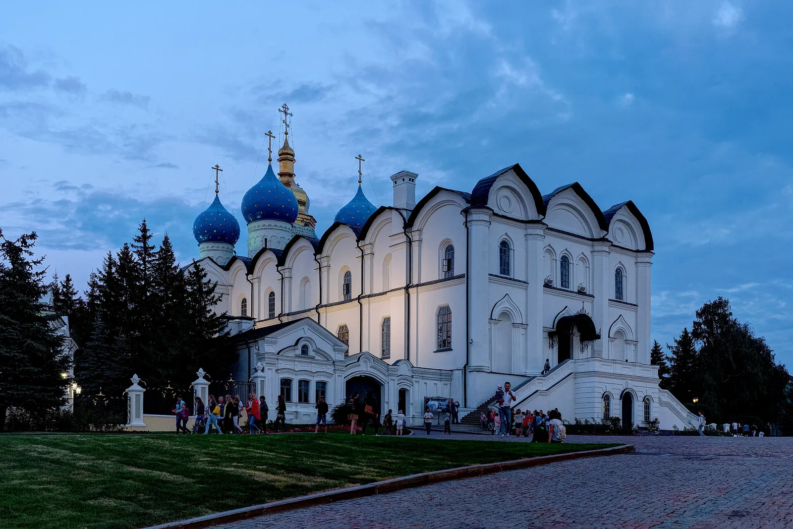White stone cathedral with blue onion domes inside the Kazan Kremlin