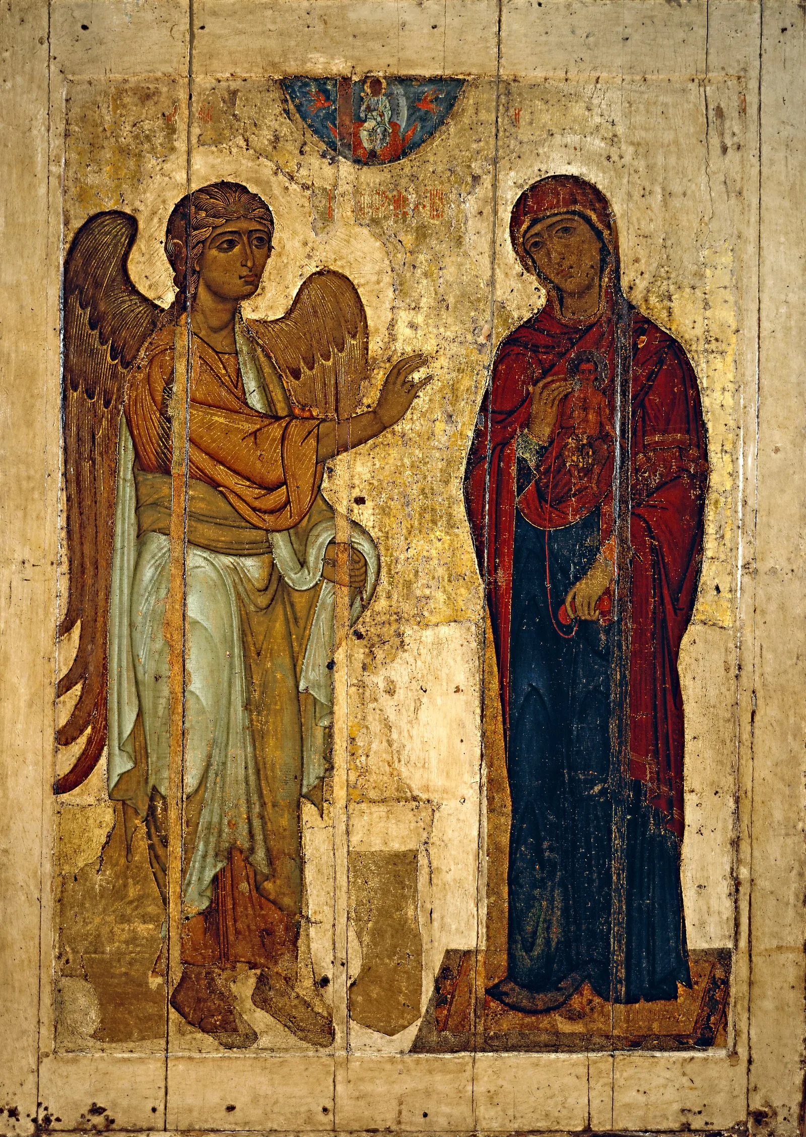 Tall icon of the Annunciation with the archangel Gabriel on the left and the standing Virgin Mary on the right
